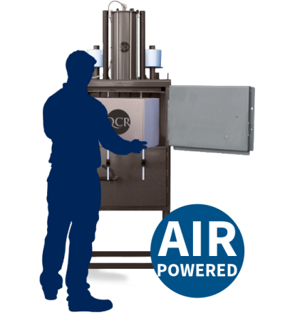 Silhouette of a person using a small pneumatic baler